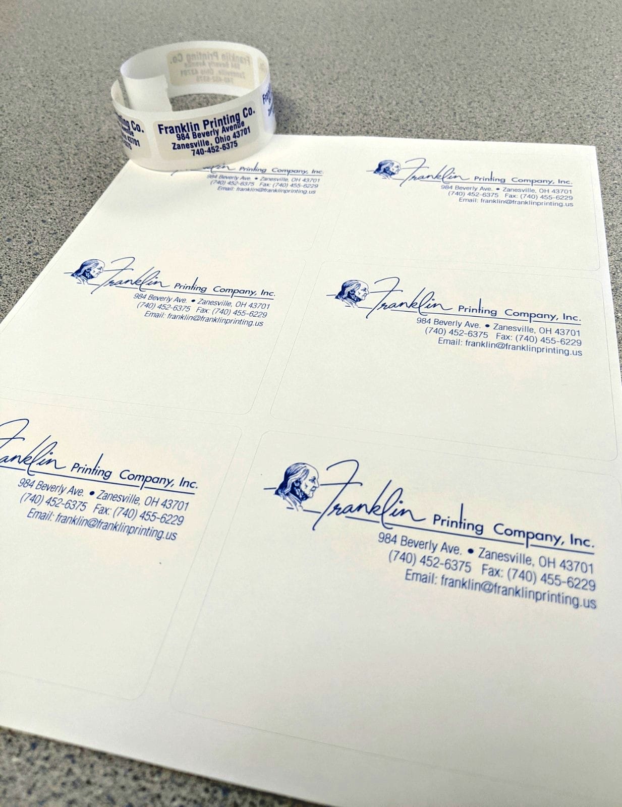 Sheet of die-cut Franklin Printing return-address stickers